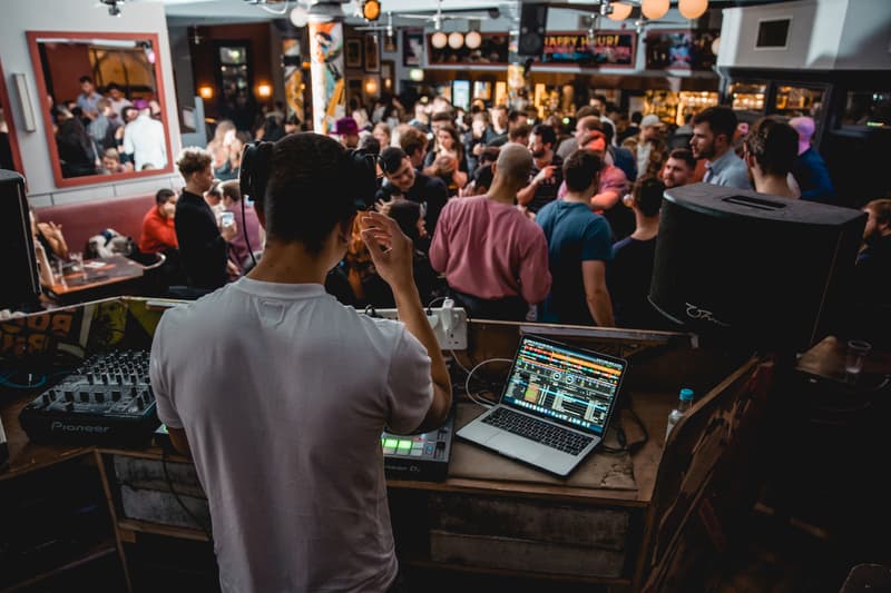 View from behind Austin Ventour's decks over a packed London dancefloor
